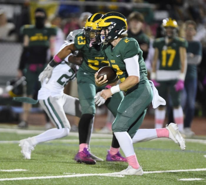 San Ramon Valley quarterback Luke Baker (2) on the run.